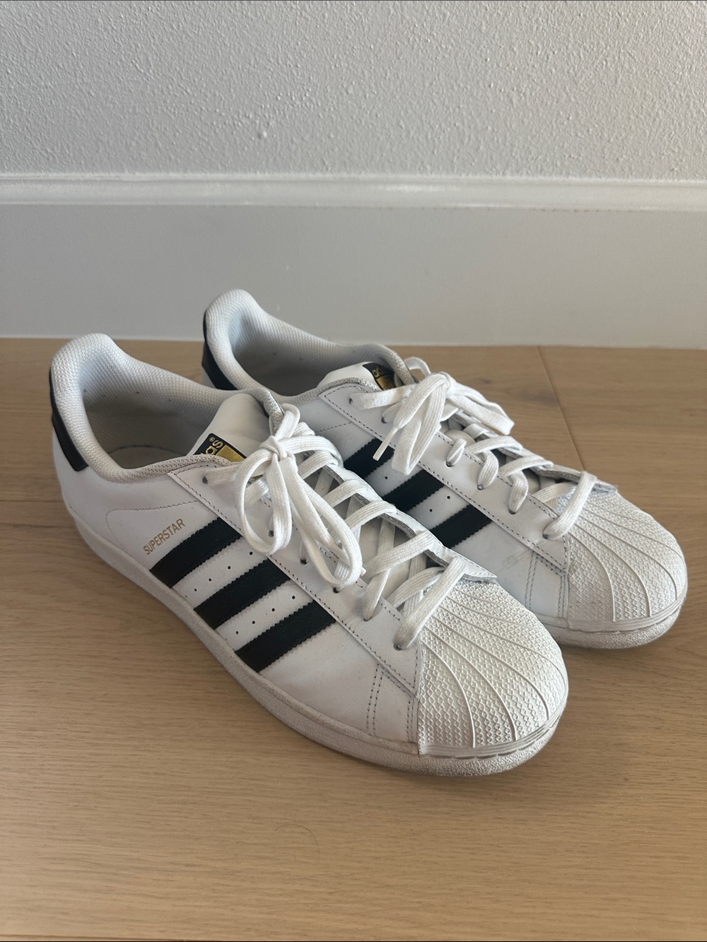 adidas Superstar Sneakers in White and Black